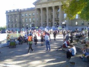 Hundreds of people gathered in the Alberta Legislature Grounds